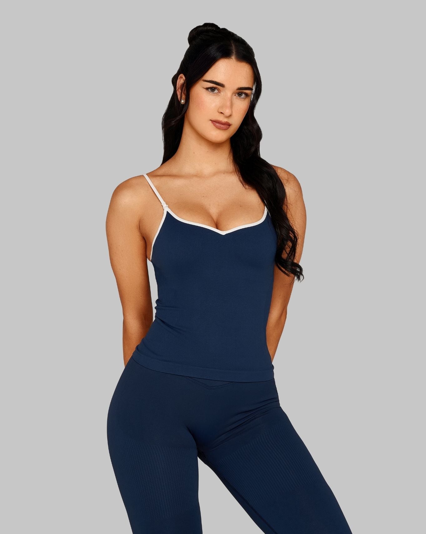 Bliss is 5’10” and wears size XS.