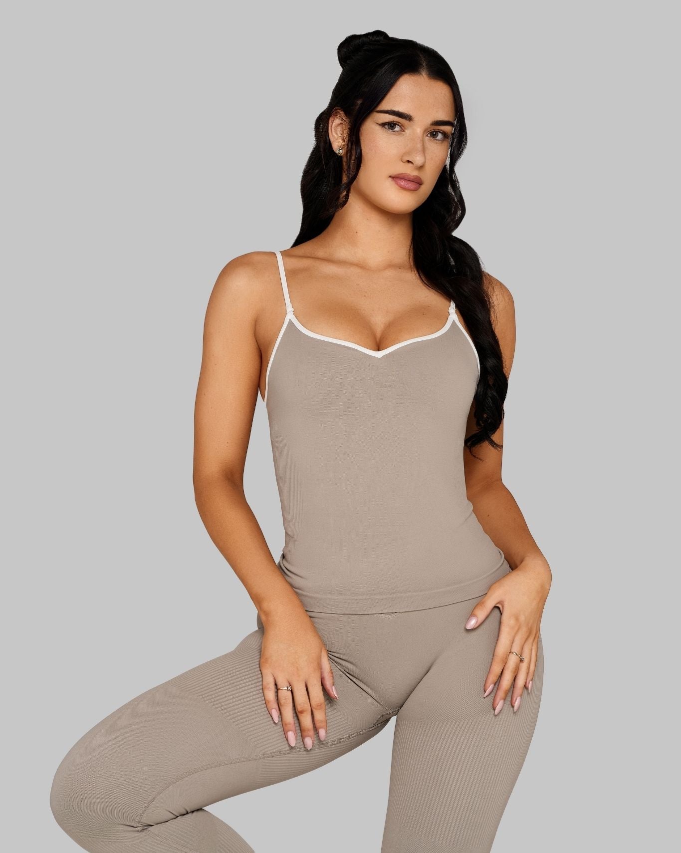 Bliss is 5’10” and wears size XS.