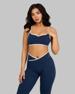 Alex is 5’5” and wears a size S.