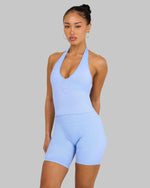 Lottie is 5’3” and wears size XS.