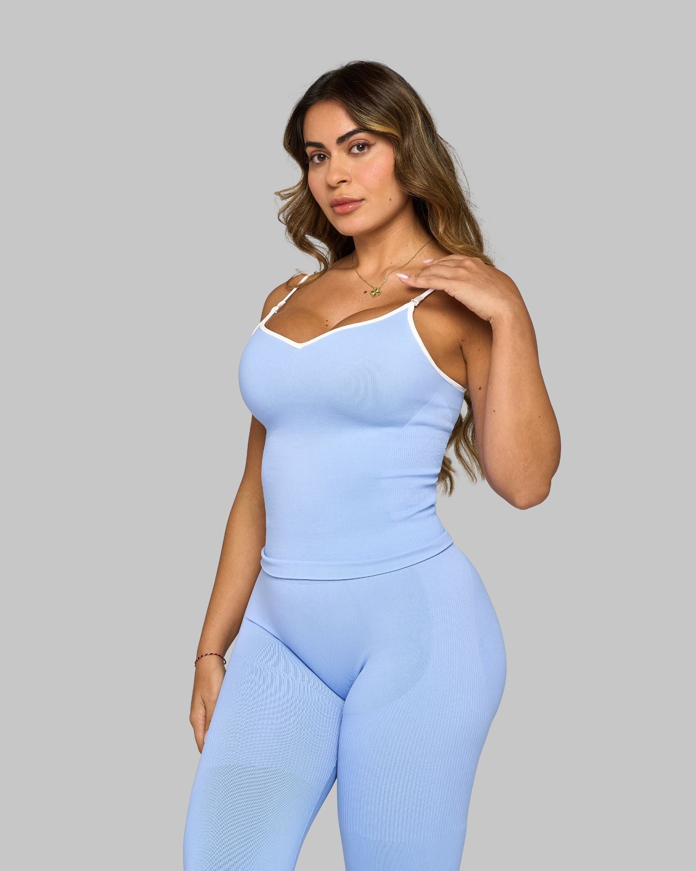 Chiara is 5’6” and wears size S.