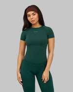 Alex is 5’5” and wears size XS.