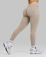 Lottie is 5’3” and wears a size XS.